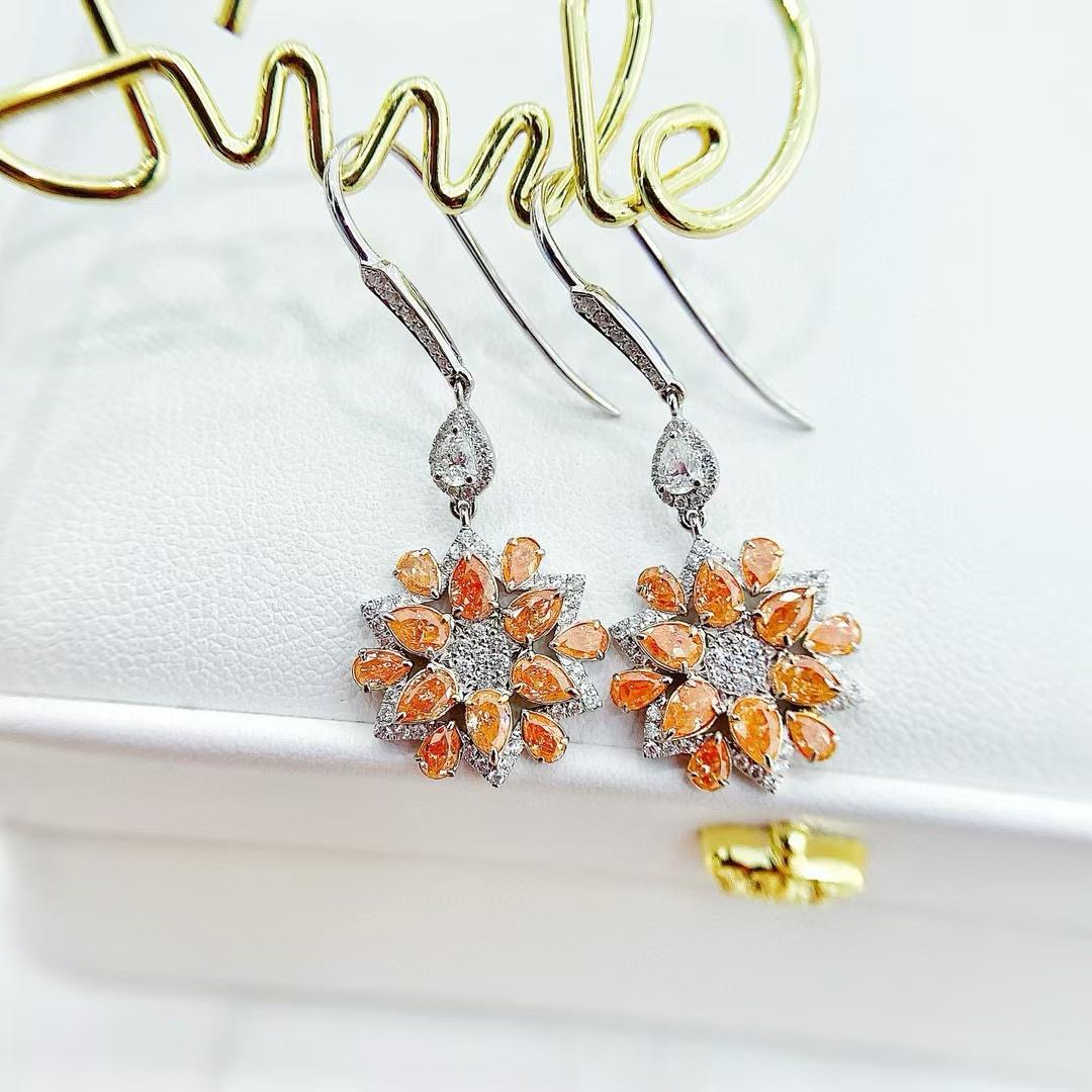 Modern 18K White Gold Pear-Cut Vivid Orange Diamond Sunflower Earrings For Sale