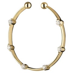 Manchette d'oreille en or 18k avec diamants