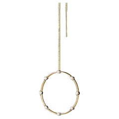 Boucle d'oreille en or 18k avec diamants