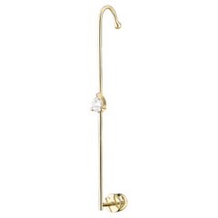 18k gold earring with pear-cut diamond