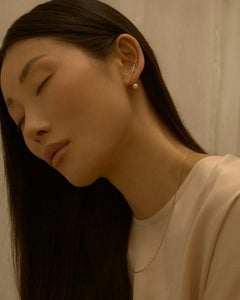 14k gold earring with river pearl