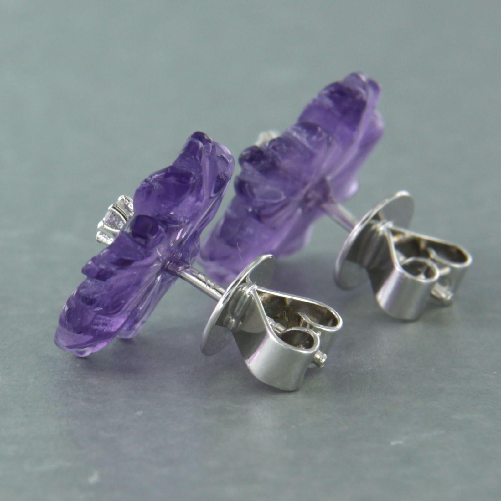 Brilliant Cut 18k gold earrings with flower shape cut amethyst and brilliant cut diamond