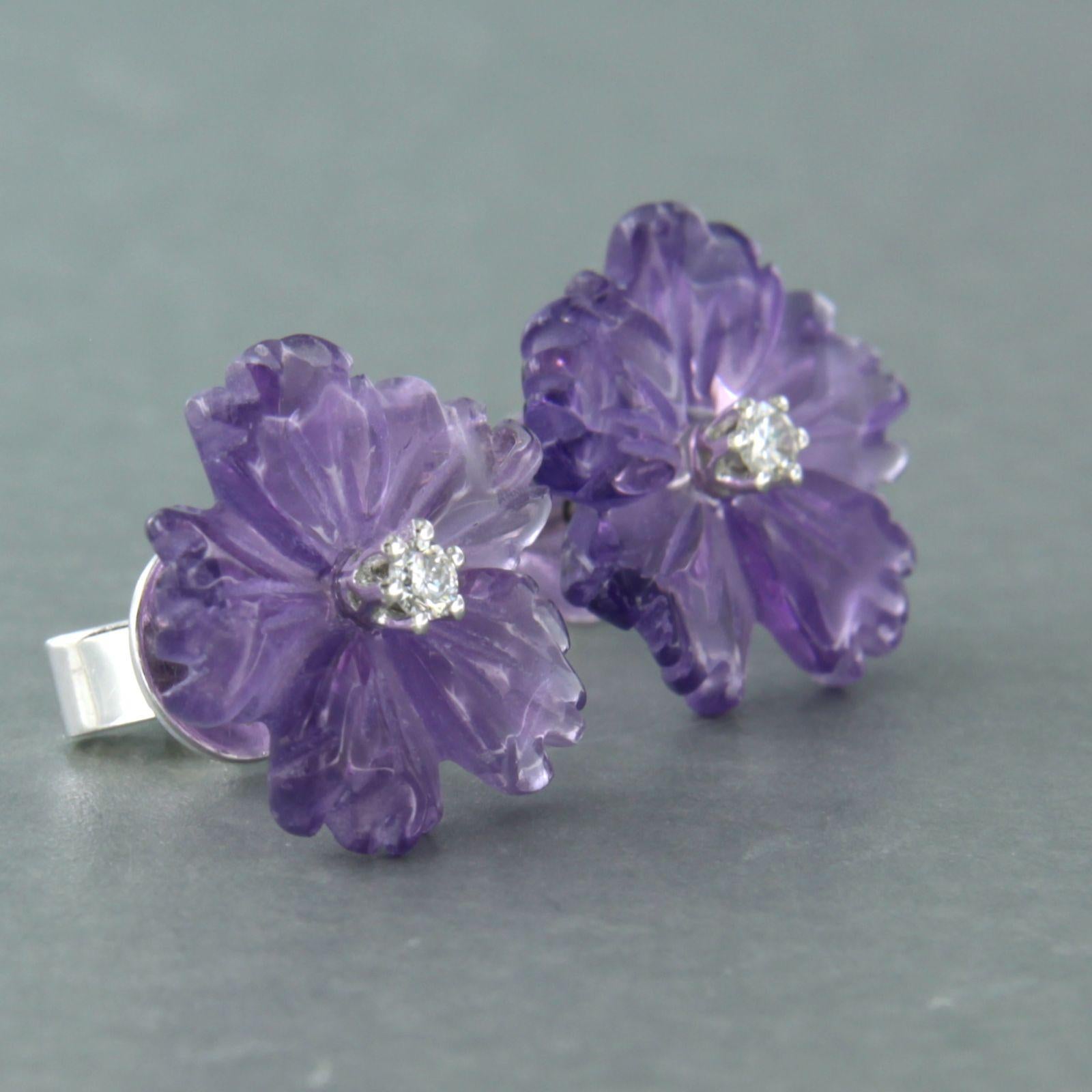 Women's 18k gold earrings with flower shape cut amethyst and brilliant cut diamond