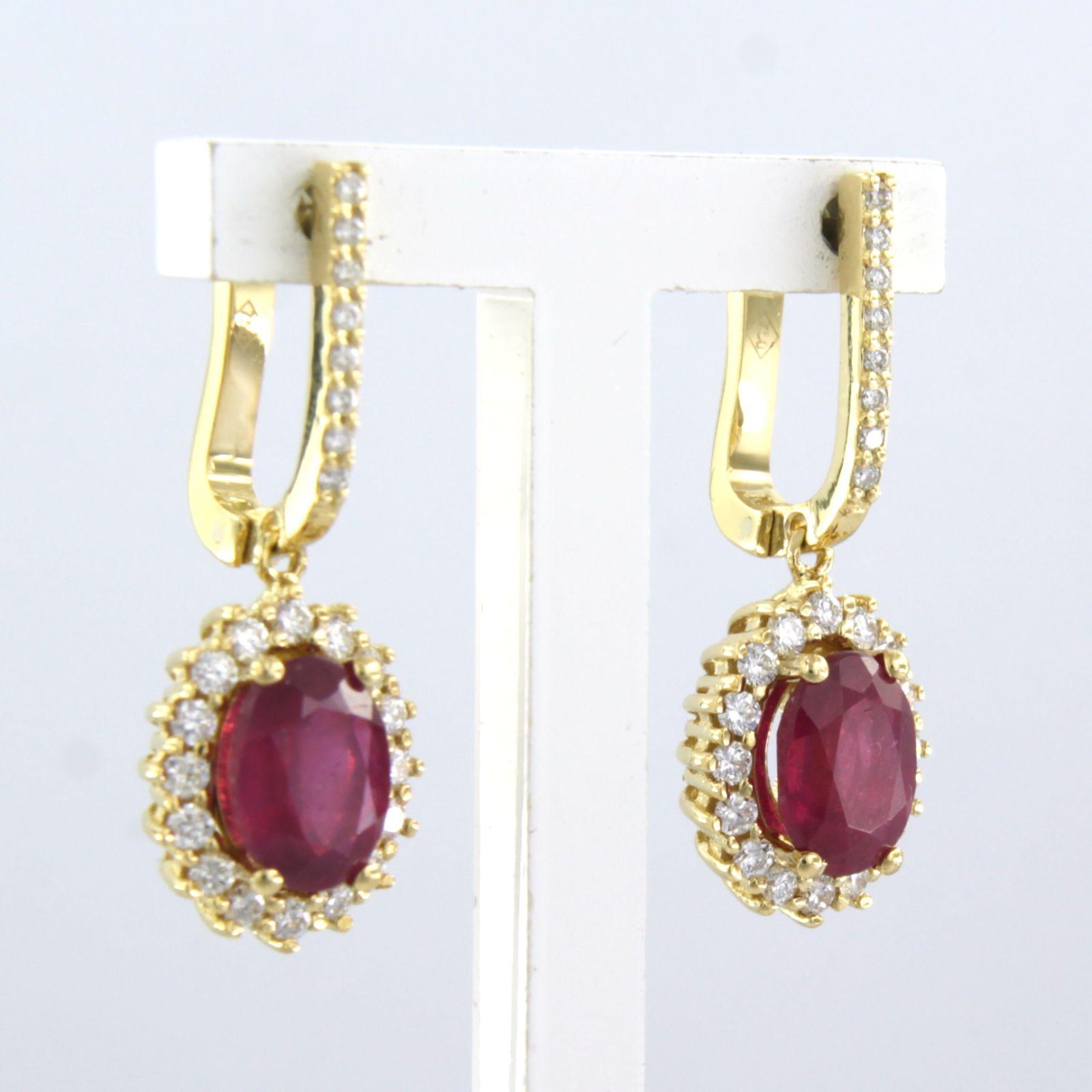 Modern 18k gold earrings with ruby to. 3.40ct and brilliant cut diamonds up to.0.64ct For Sale