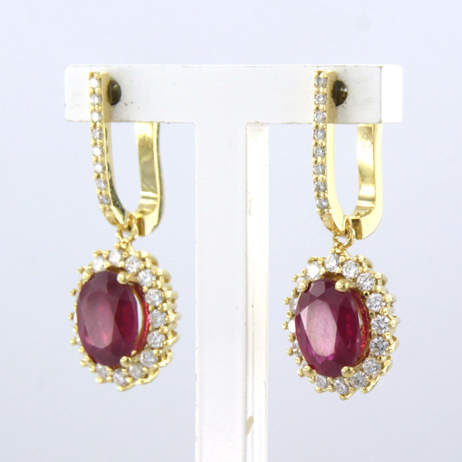 Brilliant Cut 18k gold earrings with ruby to. 3.40ct and brilliant cut diamonds up to.0.64ct For Sale