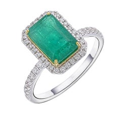 Anillo Halo de Esmeralda y Diamante de Oro de 18K