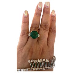 18k Gold Emerald and Diamond Ring, 11.70 carat Emerald .82 carats Diamond Ring
