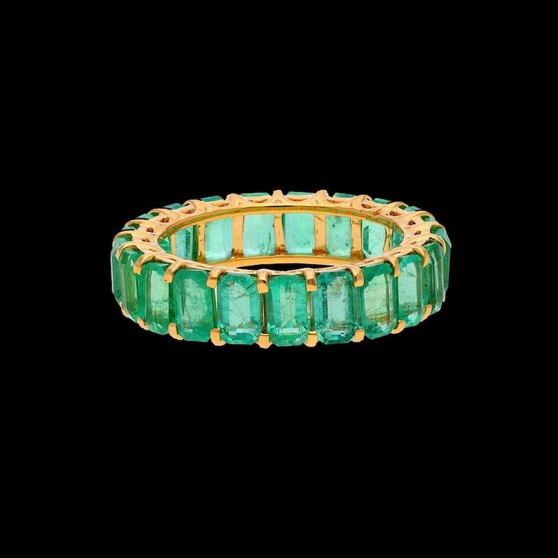 Contemporary 18k Gold Emerald Cut Emerald Ring  6.78 Cts. Natural Emerald Eternity Band Ring