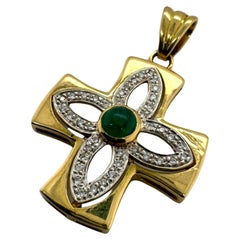 18K Gold Emerald
Diamond Cross Pendant 18K Gold Emerald
Diamond Cross Pendant