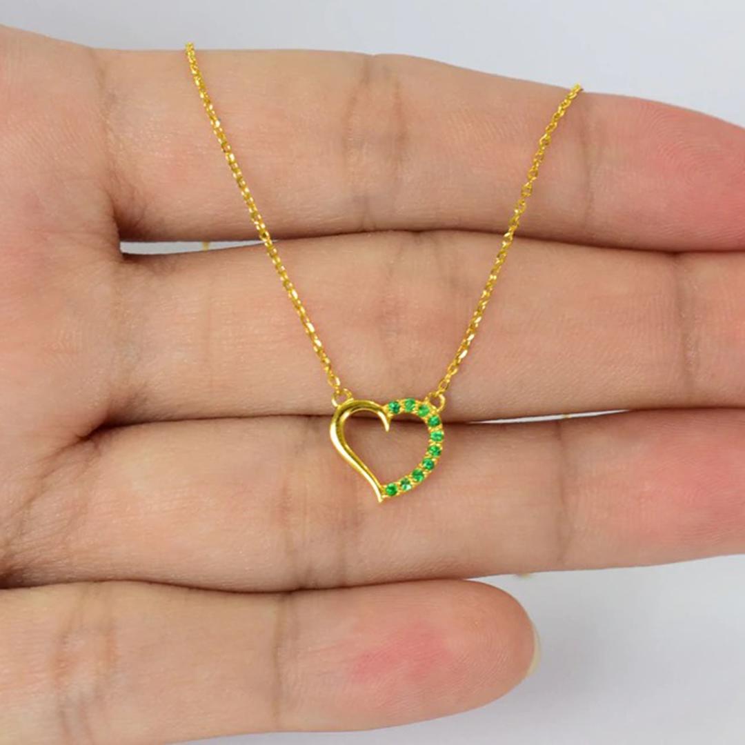 Beautiful little minimalist necklace is made of 18k solid gold adorned with natural AAA quality Emerald.
Available in three colors of gold: White Gold / Rose Gold / Yellow Gold

Perfect for wearing by itself for a minimal everyday style or layered