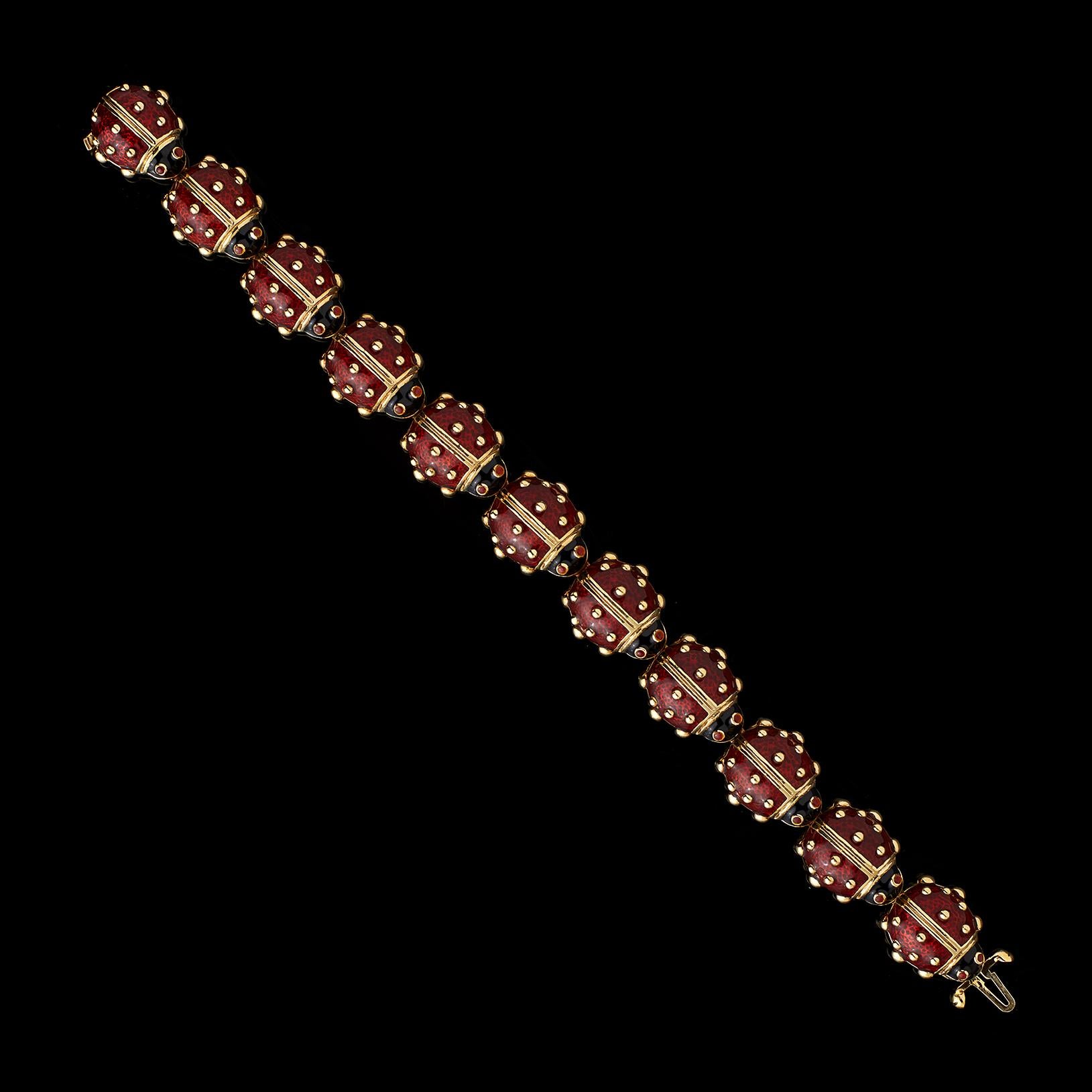 A charming Hidalgo link bracelet circa 1993 designed with 11 enameled ladybugs, this piece is sure to bring good luck! The bracelet weighs 44.1 grams and measures approximately 6 7/8 inches. A rare find, sure to be a welcomed addition to any