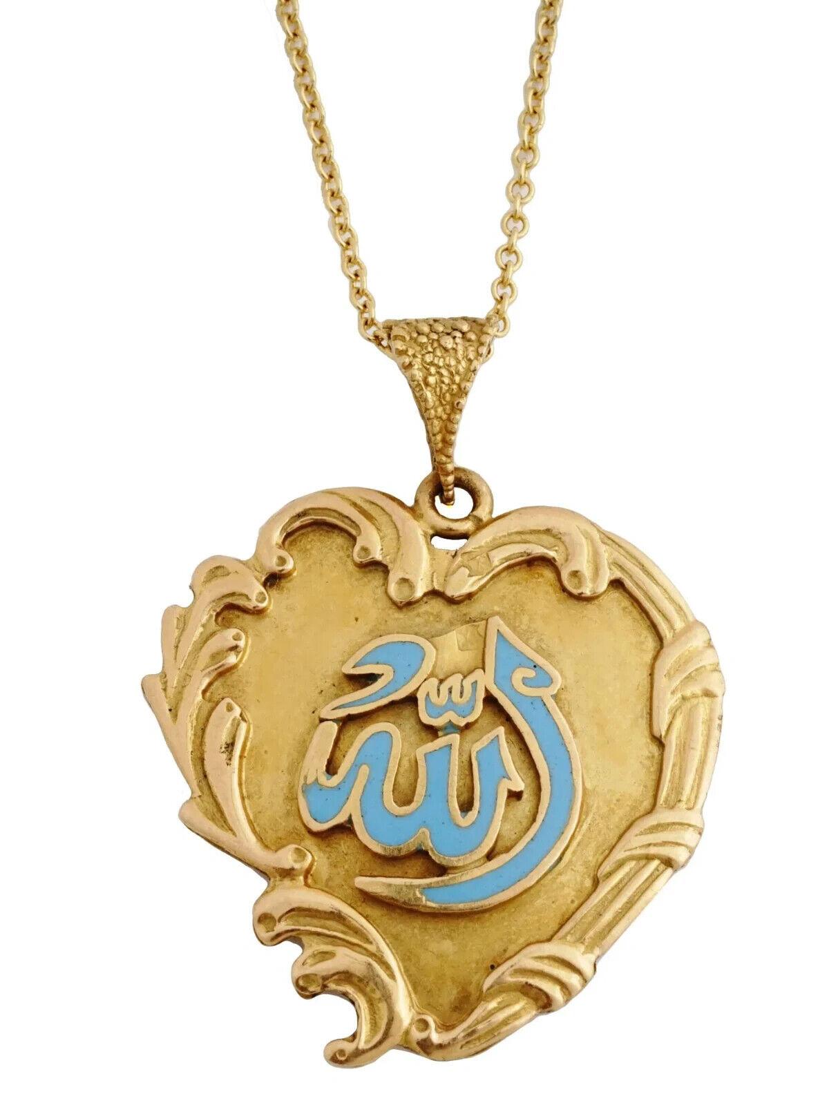 A vintage 18K yellow gold cable chain necklace with a pendant. The medallion is decorated with a blue-enameled Arabic calligraphy, the name of Allah. Marked Italy, Fancy, 750, 18Kt on the clasp. Total Weight: 6 grams. Islamic Religious Jewelry For