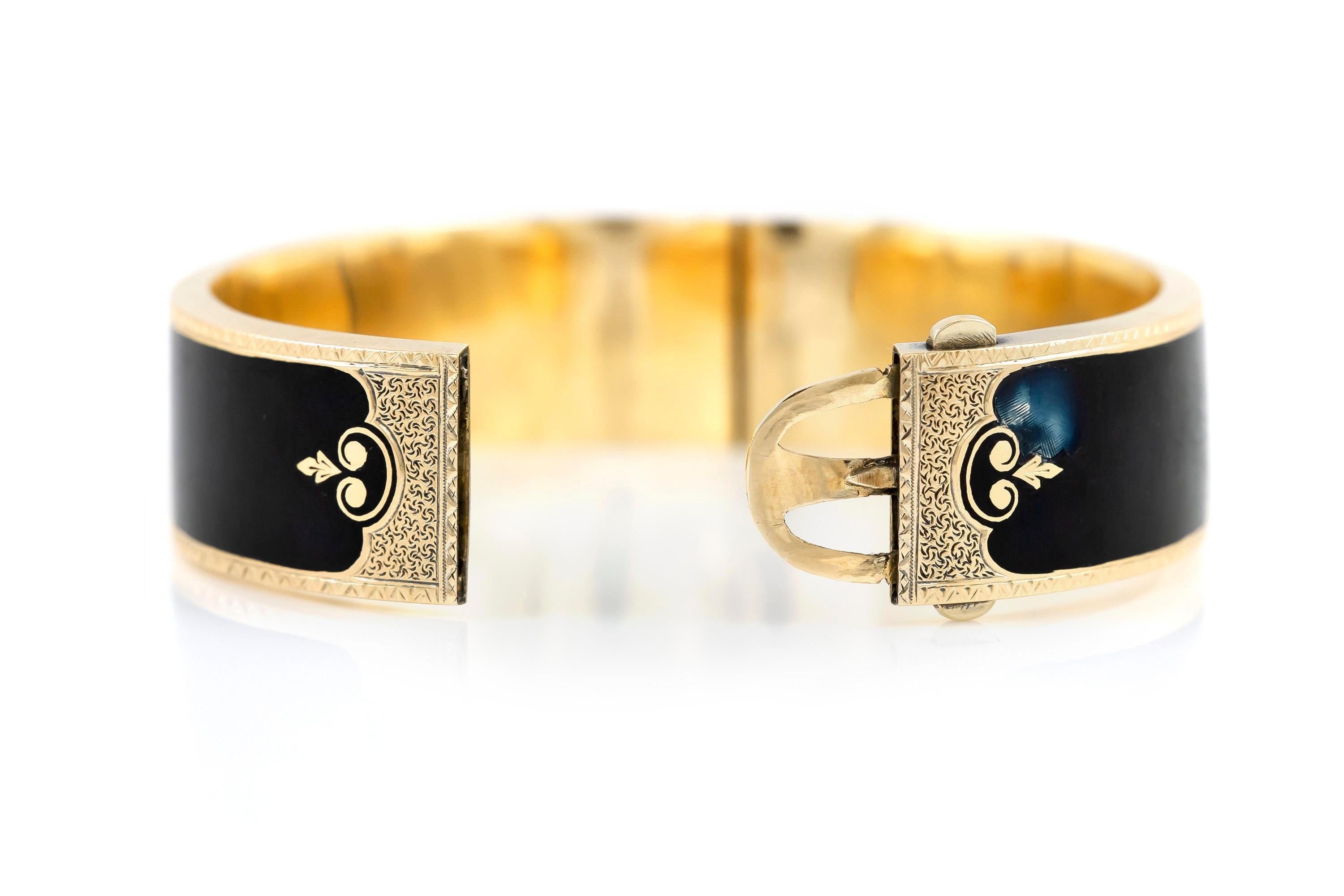 The bangels are finely crafted in 18k yellow gold and cover by black enamel with few pearls in front of the bracelet.

(The price is for the two )