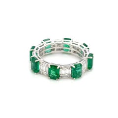 18k Gold Eternity Ring with 32 Round Diamonds Cts 0.09 48 Baguette Diamonds 0.82