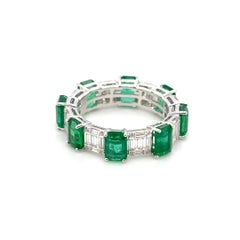 18k Gold Eternity Ring with 32 Round Diamonds Cts 0.09 48 Baguette Diamonds 0.82