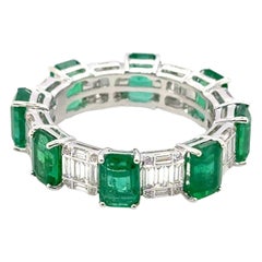 18k Gold Eternity Ring with 32 Round Diamonds Cts 0.09 48 Baguette Diamonds 0.82