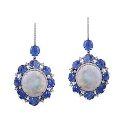 18K gold Ethiopian Opal and carved Burmese Sapphire studs/dangler earring