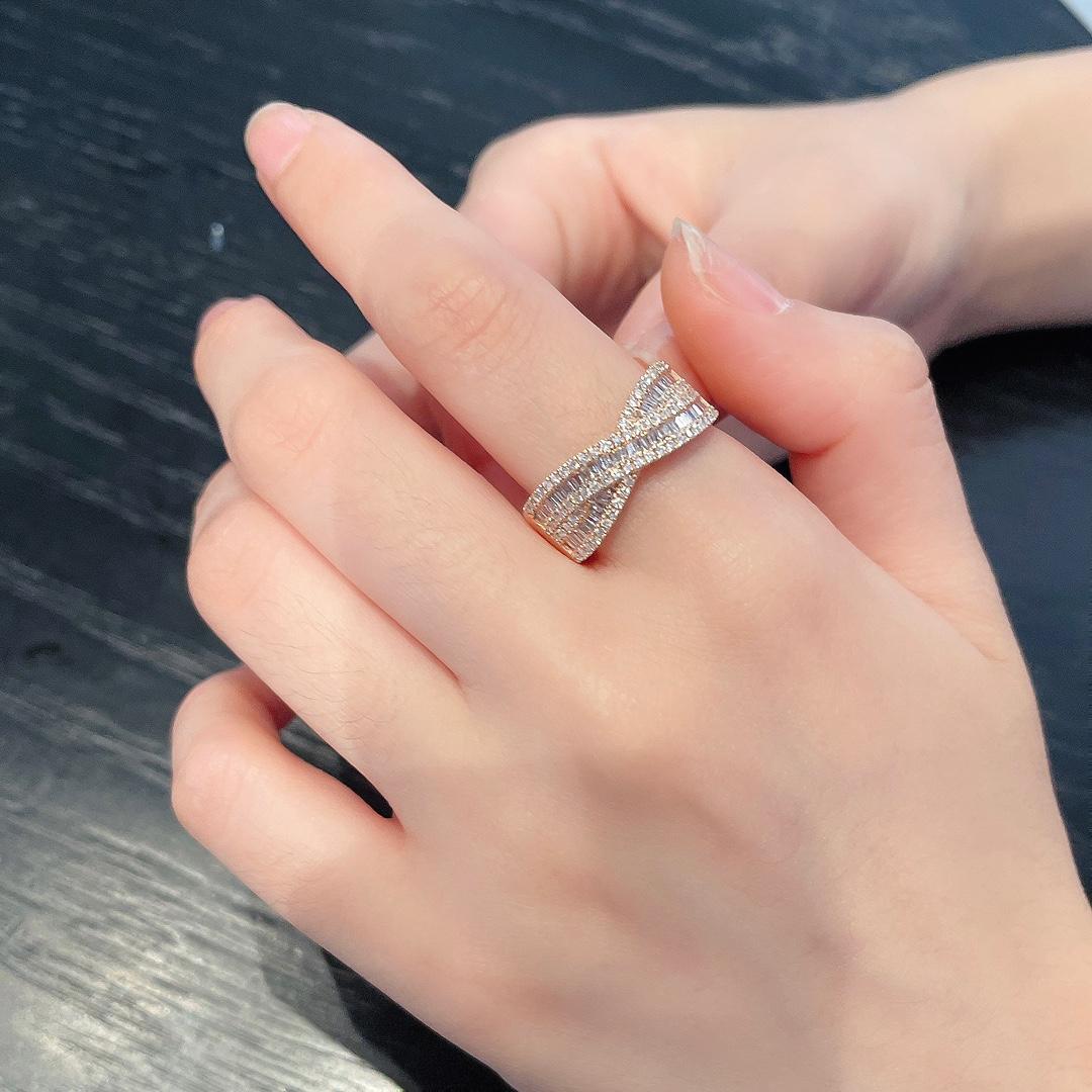 18k Gold Exclusive Designer X Ring with White Diamonds

Total Weight: 3.85 g
Net Gold Weight: 3.726 g
Main Stones: 54 Red Diamonds, 0.270 CT
Secondary Stones: 76 White Diamonds, 0.350 CT
This luxurious 18k gold ring showcases a striking X design,