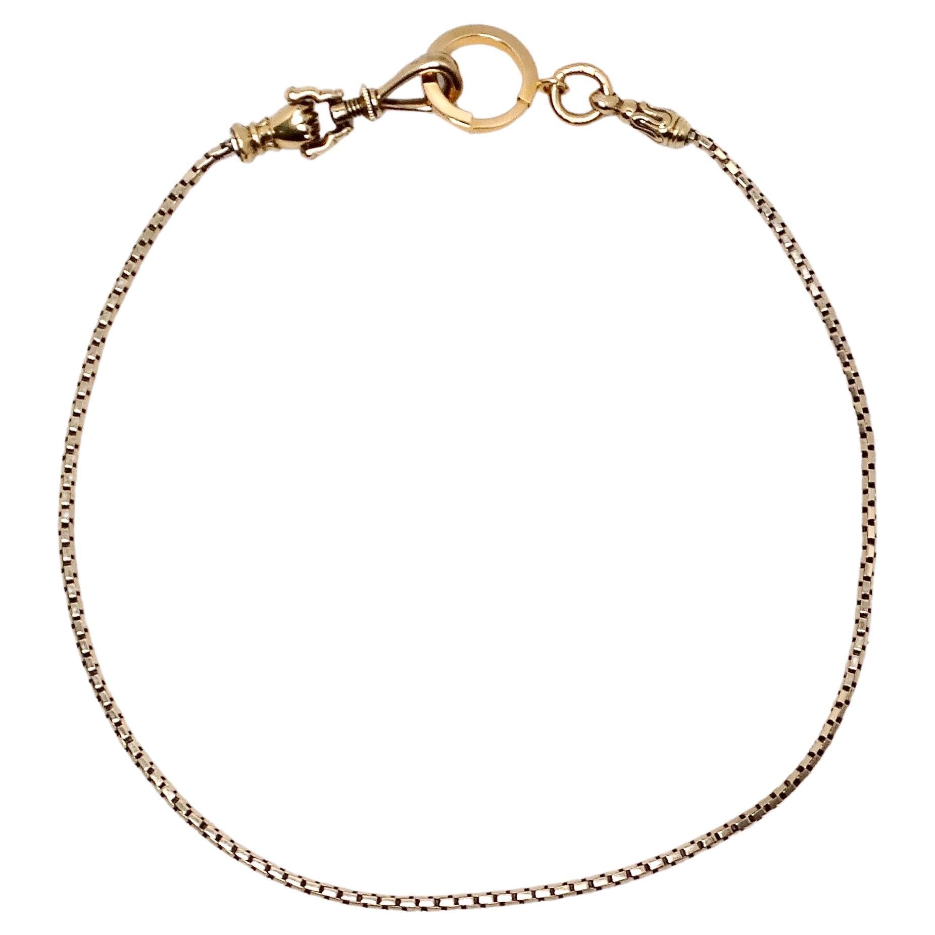 Chaîne de montre de poche poing en or 18k
