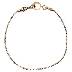 Chaîne de montre de poche poing en or 18k