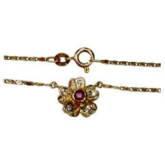 Collana con fiori in oro 18K