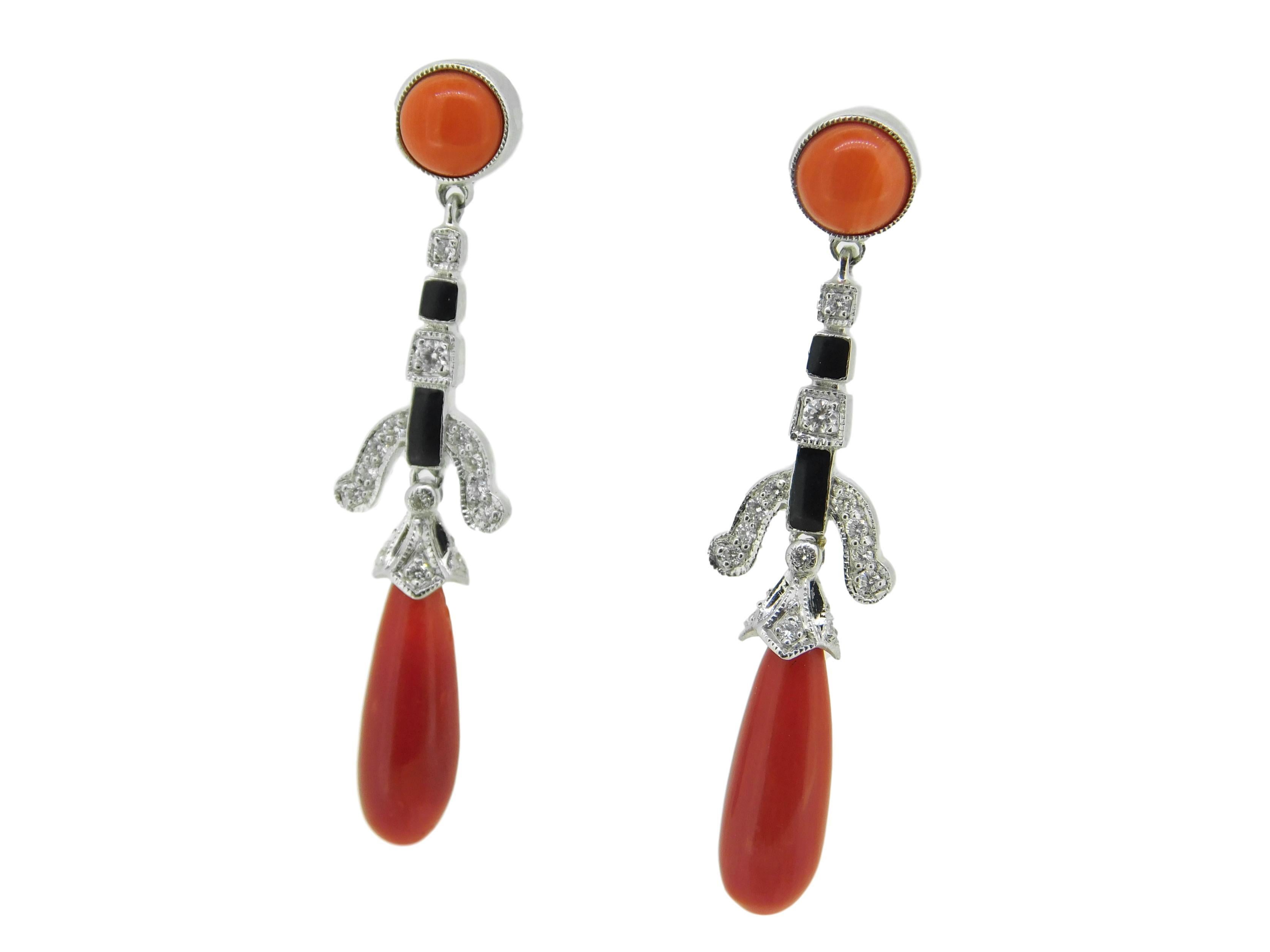 18k Gold Genuine Natural Coral Briolette Diamond and Enamel Earrings (#J4708)

18k white gold earrings featuring ox blood coral briolette drops accented by diamonds and black enamel. The earrings measure 1 7/8