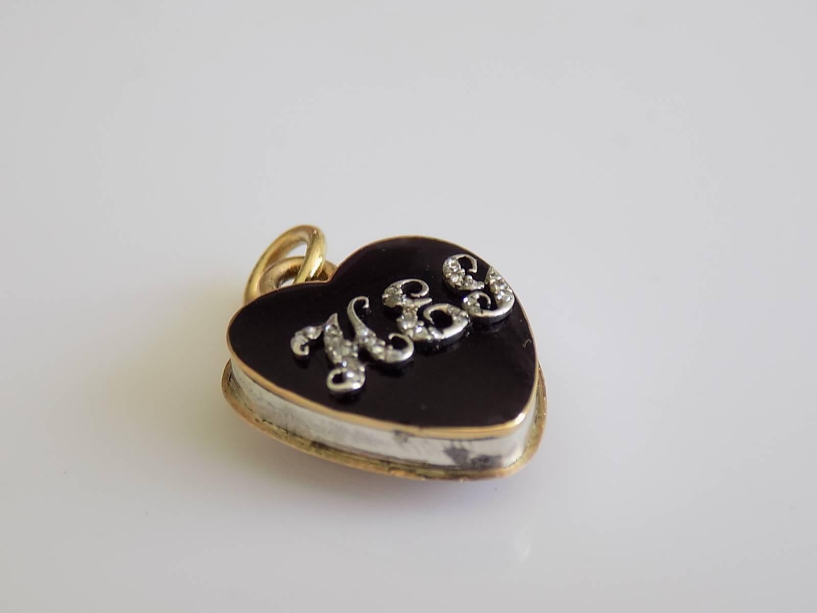 An One of a Kind Georgian c.1810 black enamel and rose cut Diamond heart locket pendant in Silver and Gold with initials HEG and filled with crystals. English origin.
Total drop including jump rings 18mm, width 14mm.
Unmarked, tested Silver and 18