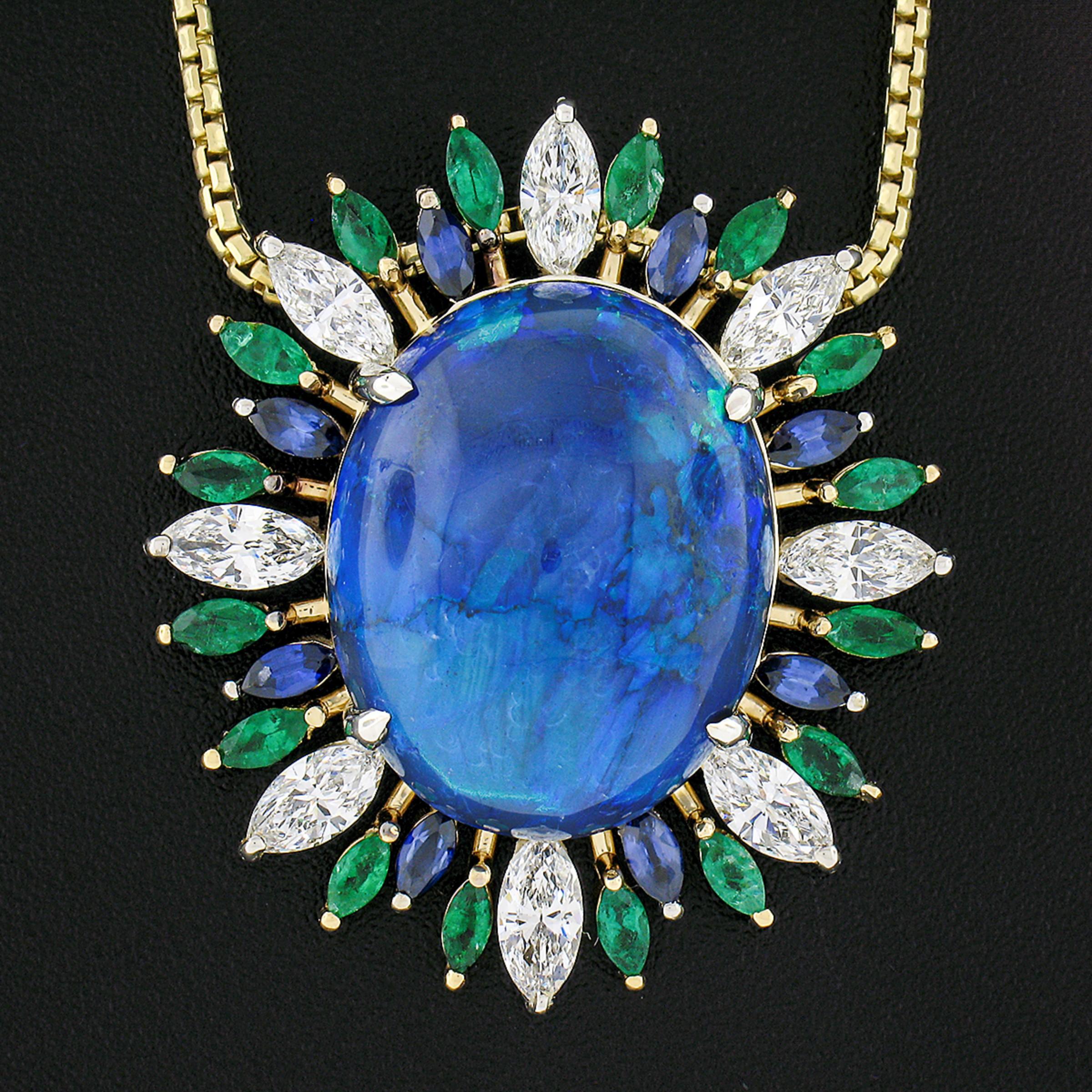 Here we have an absolutely magnificent and jaw dropping pendant that that is well crafted from solid 18k yellow and white gold. The pendant features a gorgeous, GIA certified, gray opal that is 100% natural and weighs exactly 19.49 carats. The oval