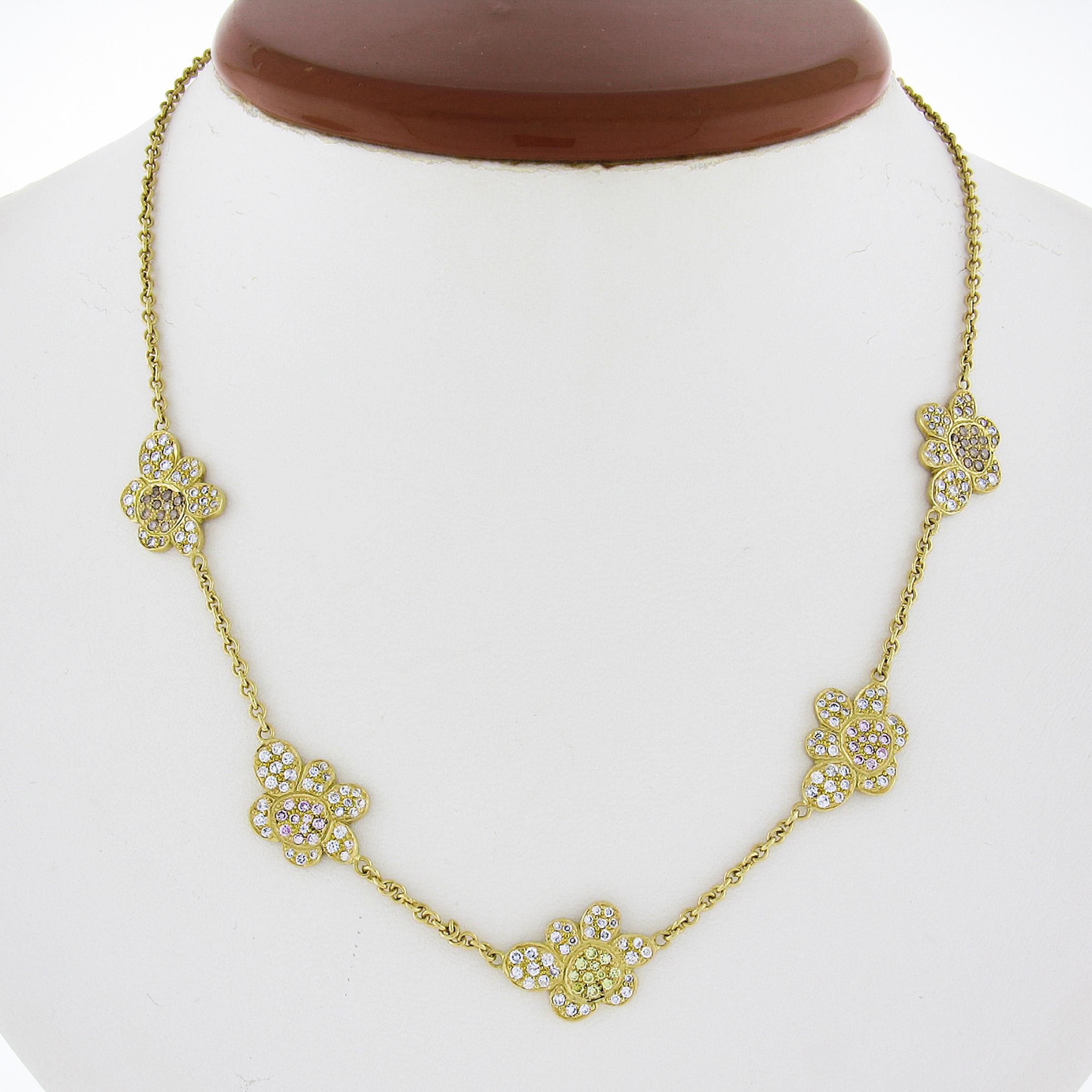 A. Un (1) brillant rond rose transparent mesurant environ 1,20  - 1,20 mm (profondeur non mesurable).
B. Une (1) mesure ronde jaune transparente et brillante .
--Conclusion:--
A. Diamants naturels, de couleur naturelle
B. Diamants naturels, de