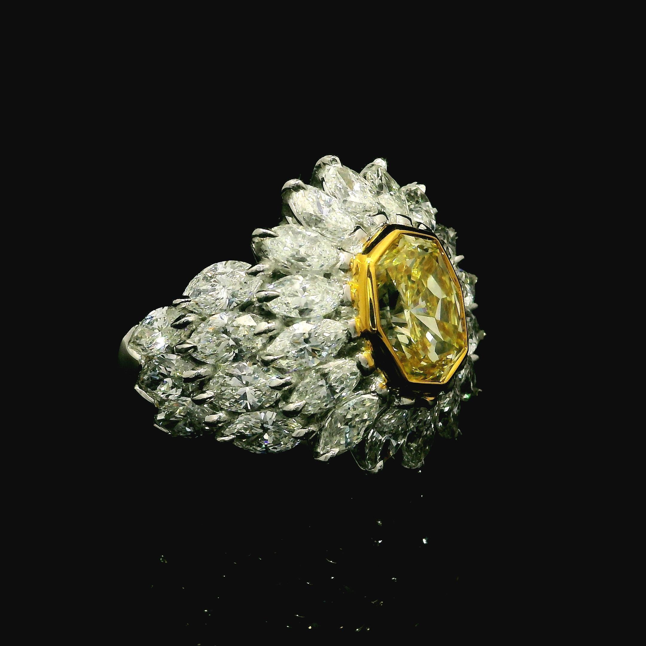 18k Gold GIA 7.24ctw Octagonal Fancy Yellow and White Marquise Diamond Ring In Excellent Condition For Sale In Montclair, NJ