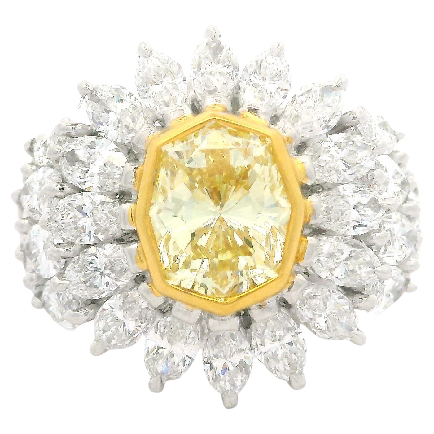 18k Gold GIA 7.24ctw Octagonal Fancy Yellow and White Marquise Diamond Ring