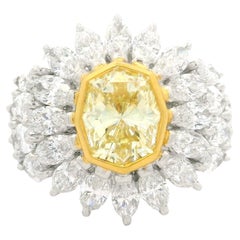 18k Gold GIA 7.24ctw Octagonal Fancy Yellow and White Marquise Diamond Ring