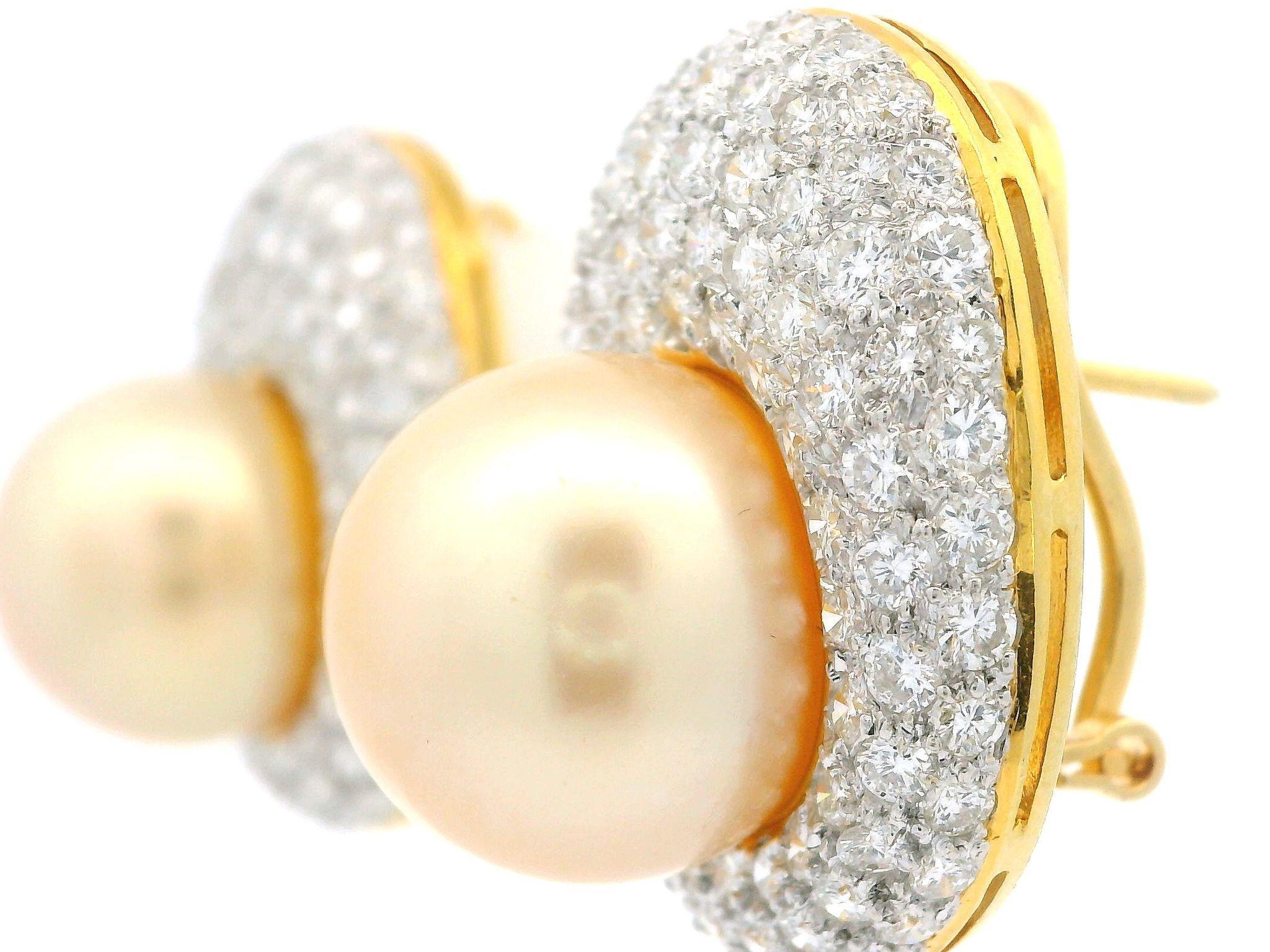 --Stone(s):--
(2) Genuine Cultured Saltwater Pearls - Near Round Shape - Natural Golden Color - 14+mm (exact - certified)
** See Certification Details Below for Complete Info **
Numerous Natural Genuine Diamonds - Round Brilliant Cut - Pave Set -