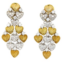 Pendientes de oro de 18 quilates y oro blanco con diamantes en forma de corazón