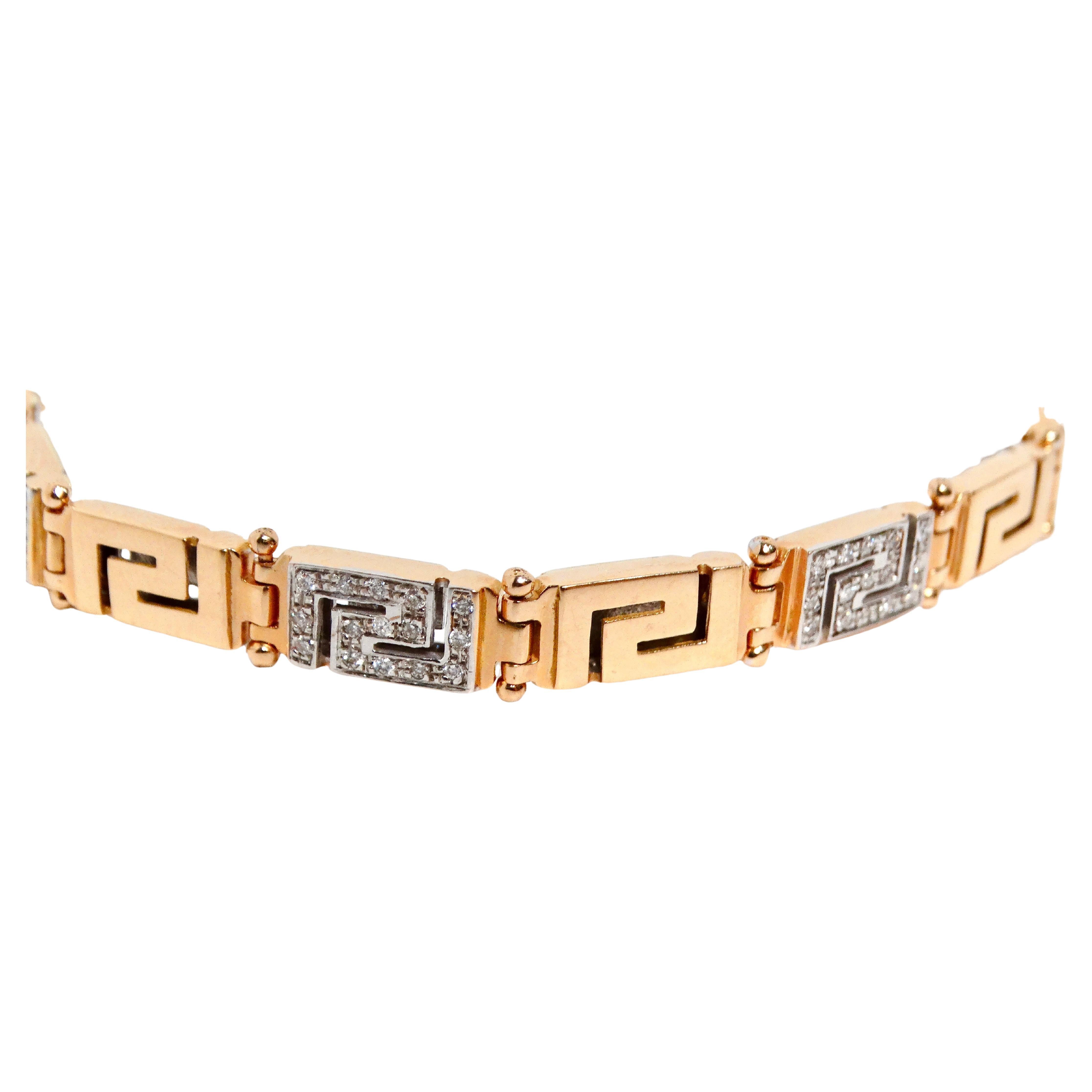 Elevate your jewelry collection with this stunning 18k Gold Greek Key Two-Tone Link Bracelet, featuring intricate diamond accents that lend a touch of luxury and sophistication. The bracelet's unique Greek key design, symbolizing eternity and unity,