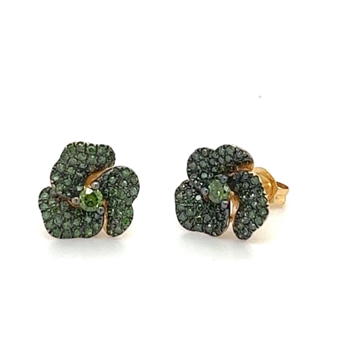 18K Gold Green Diamond Flower Earrings

18K Yellow Gold - 2.76 GM
Green Diamonds: 0.60 CT
Flowers Diameter: 10 mm

The Althoff Jewelry 18K yellow gold earrings with green diamonds combine the rich green hue of the diamonds with the warmth of the