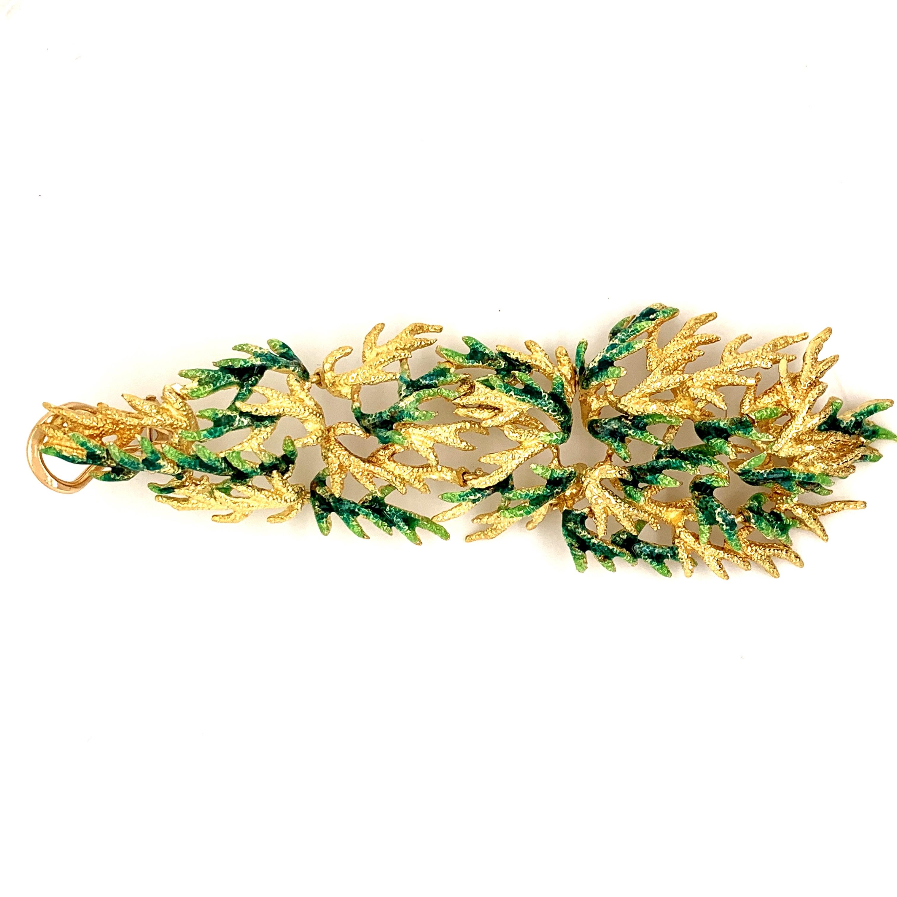 This lovely pair of 18k Gold and enamel drop earrings resemble that of a “pine tree leaf”.
Its intricate and detailed craftsmanship and light weight design allows for fluid movement thus truly resembling the natural motion of a “leaf” swaying in the