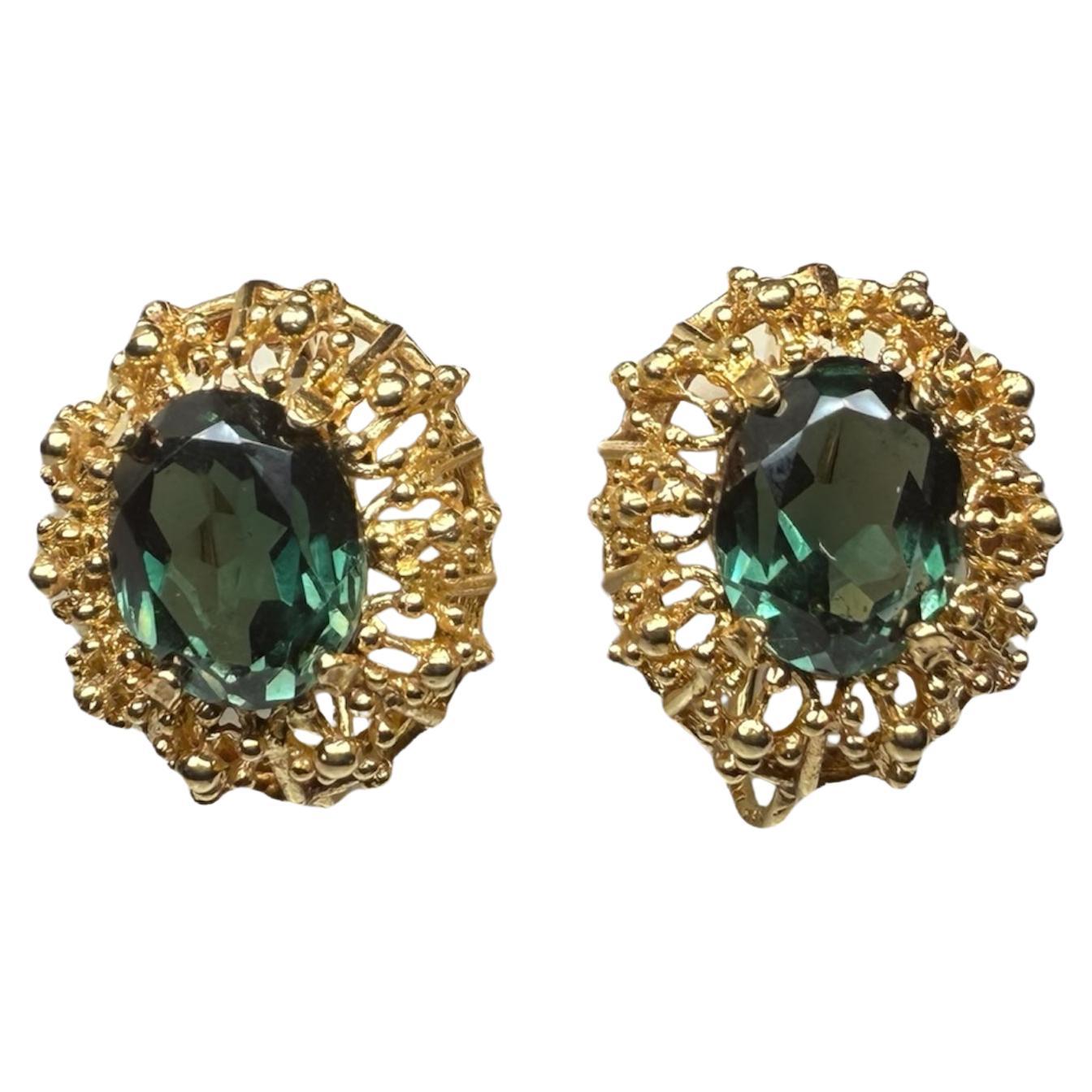 Coppia di orecchini in oro 18K con topazio verde