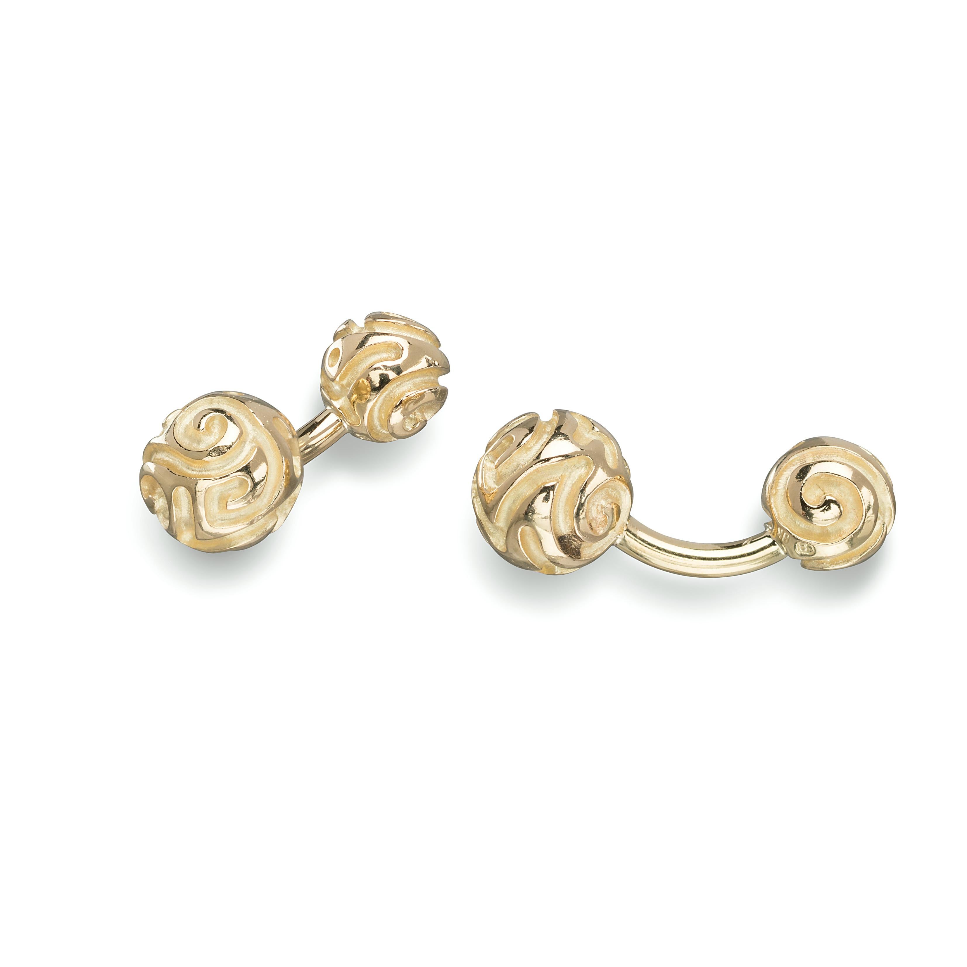 Made entirely out of 18k yellow gold, these intricately hand-carved golden balls are both stylish and sophisticated, and would pair well for anyone who is looking to up their game and maintain a balance between sophistication and artistic. 