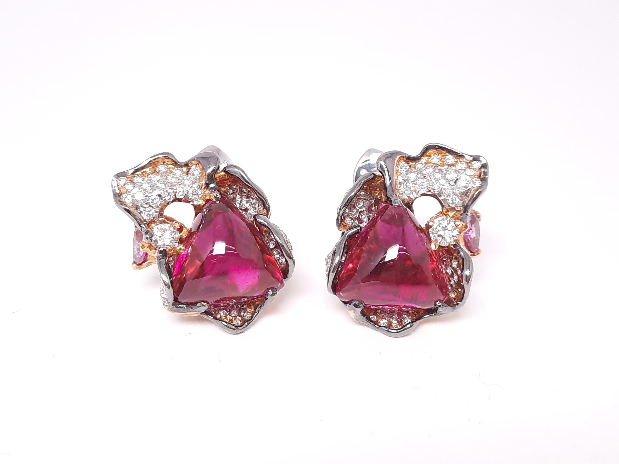 MOISEIKIN's handmade earrings capture the essence of Vincent van Gogh’s Irises, translating the Impressionist brushstrokes into a dazzling symphony of gems.

At the heart of each earring is a luscious 7.09 ct rubellite cabochon that radiates a deep,