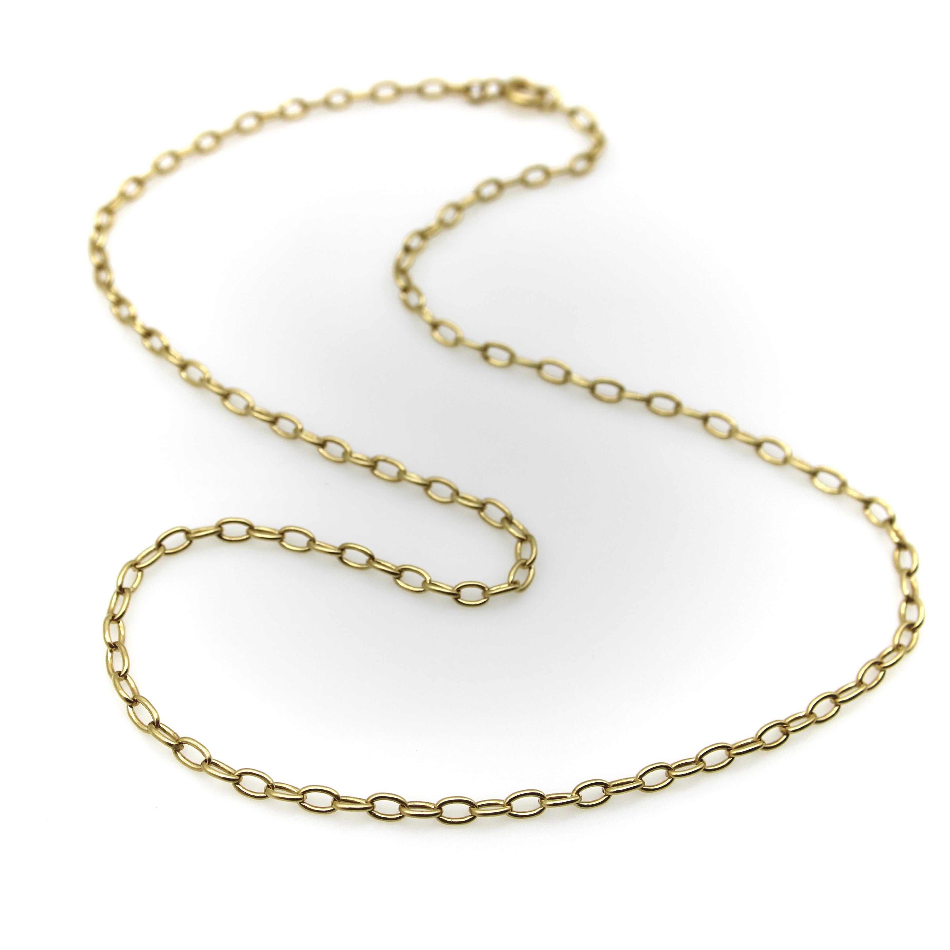 We love the handmade quality of this vintage 18k gold belcher link chain—its oval links are all nearly identical but have slight irregularities that feel more organic than a machine-made chain. The chain was created with careful attention to detail,