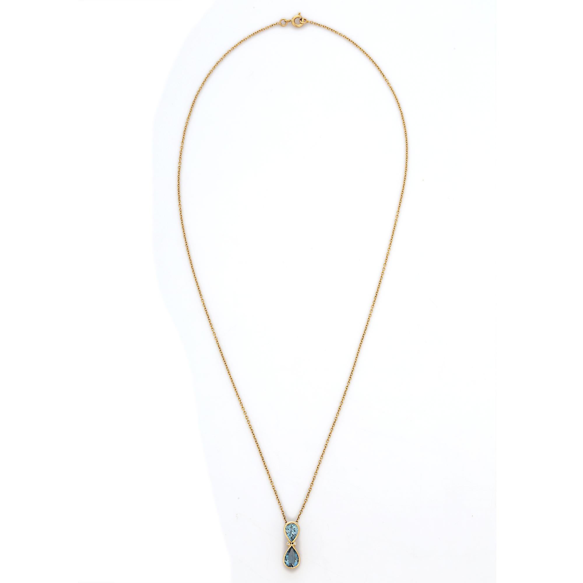 Modern 18K Gold Infinity Shaped Double Pear Cut Blue Topaz Diamond Pendant Necklace  For Sale