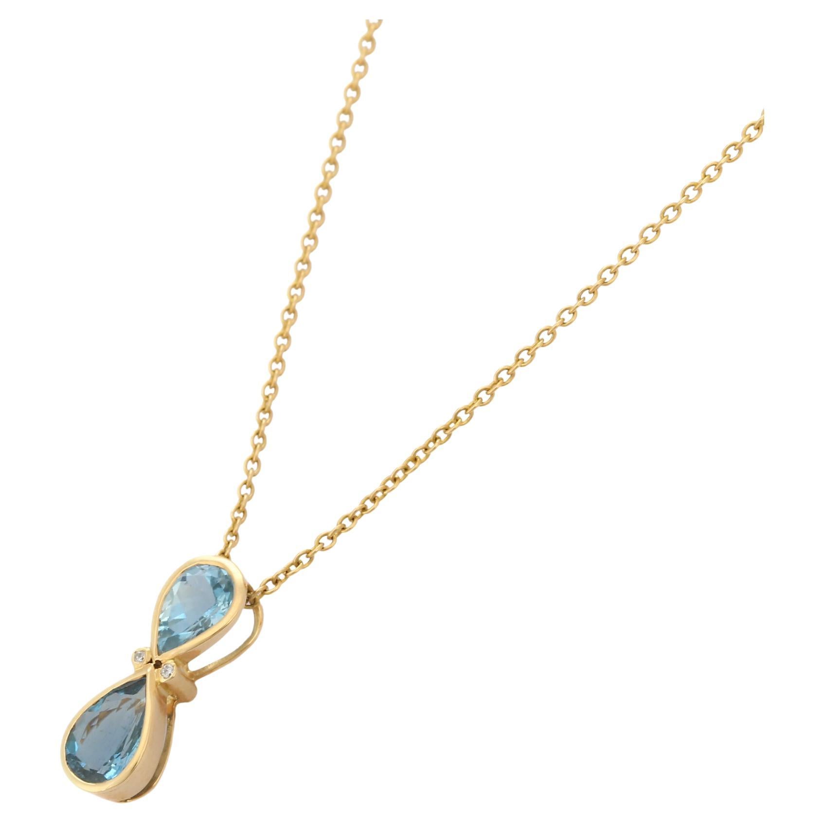 18K Gold Infinity Shaped Double Pear Cut Blue Topaz Diamond Pendant Necklace 