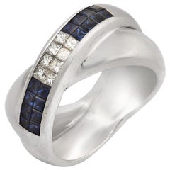 18 Karat Gold Unsichtbar gefasster Ring mit 0,43 Karat Diamanten und 0,85 Karat blauem Saphir