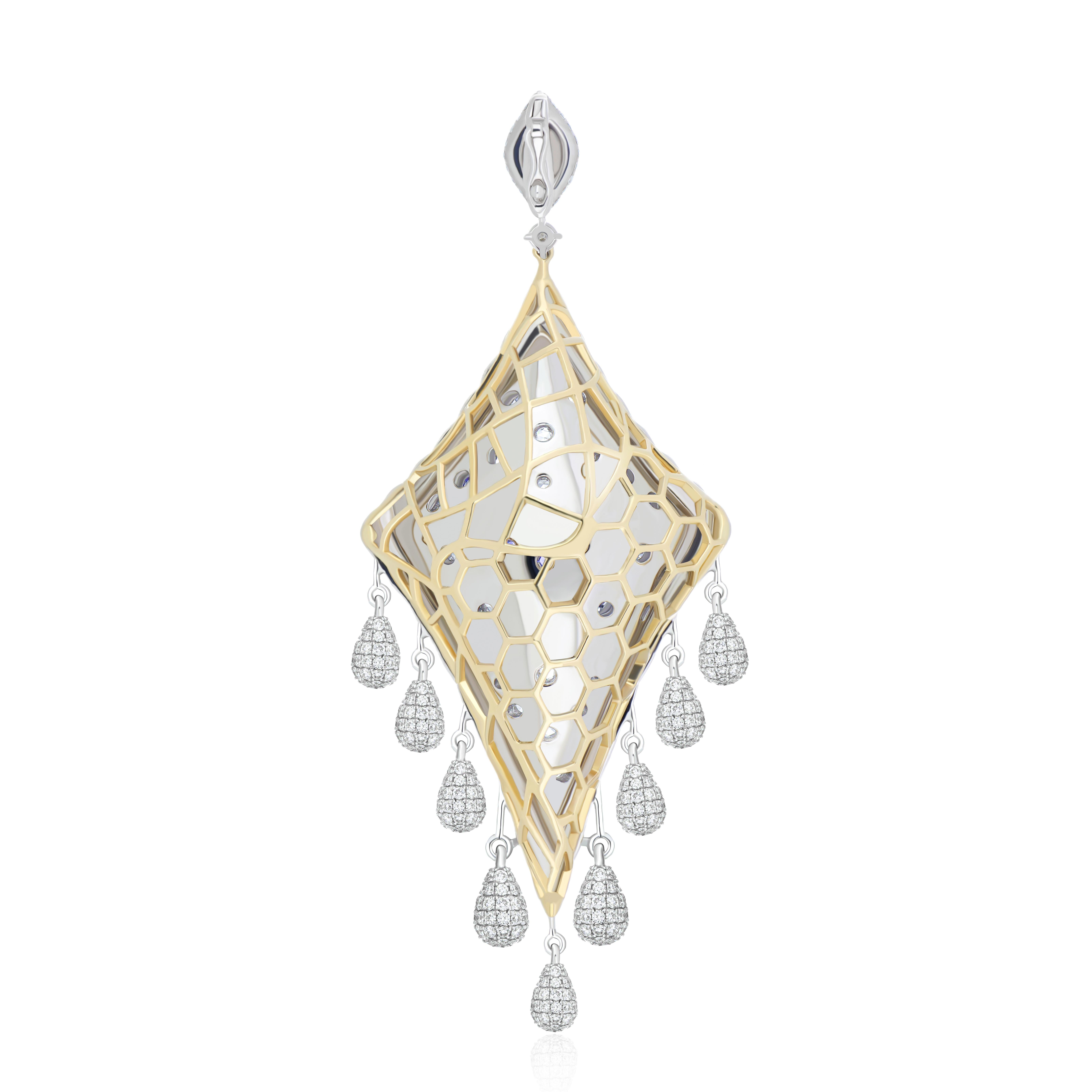 Elegant and Exquisitely detailed Gold Pendant with 16.26Cts (approx.) Fancy Shape Tanzanite set in the center beautifully accented with Micro pave set Diamonds, weighing approx. 10.55 CT's (approx.). total carat weight to further enhance the beauty