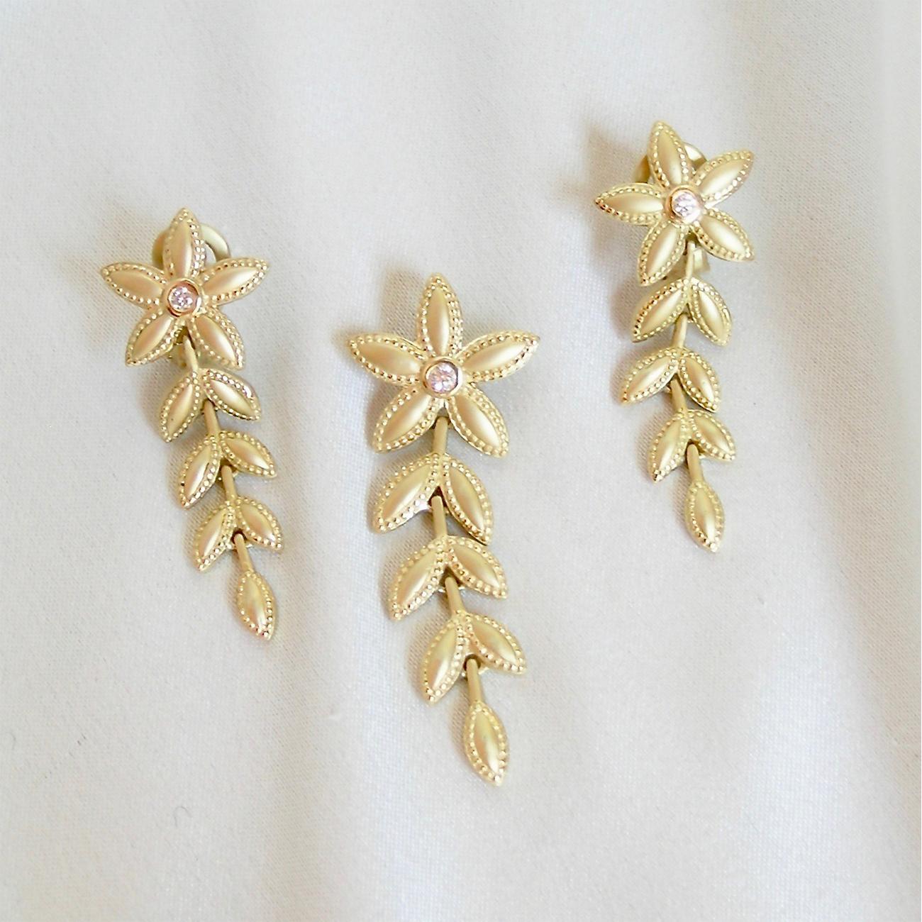 Part of the Yellow Gold, Byzantine influenced leaf collection, these earrings have wonderful movement and frame the face beautifully.  The organic nature of the design aligns itself with every day use.  As always with Nancy's earrings, they are