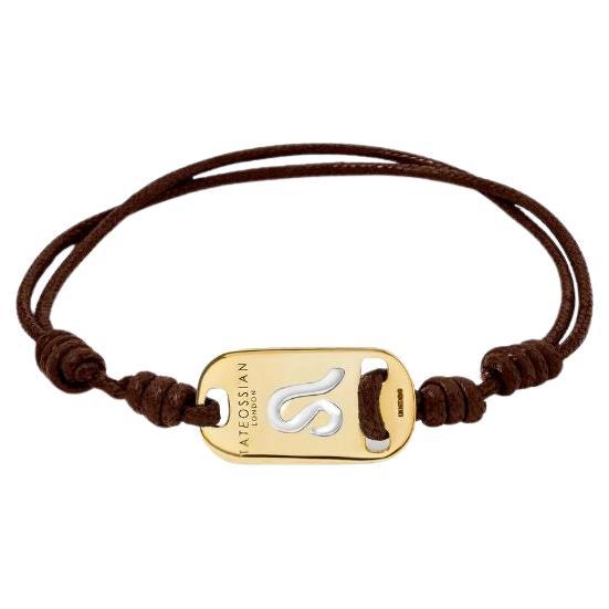 18K Gold Leo Bracelet with Brown Cord For Sale