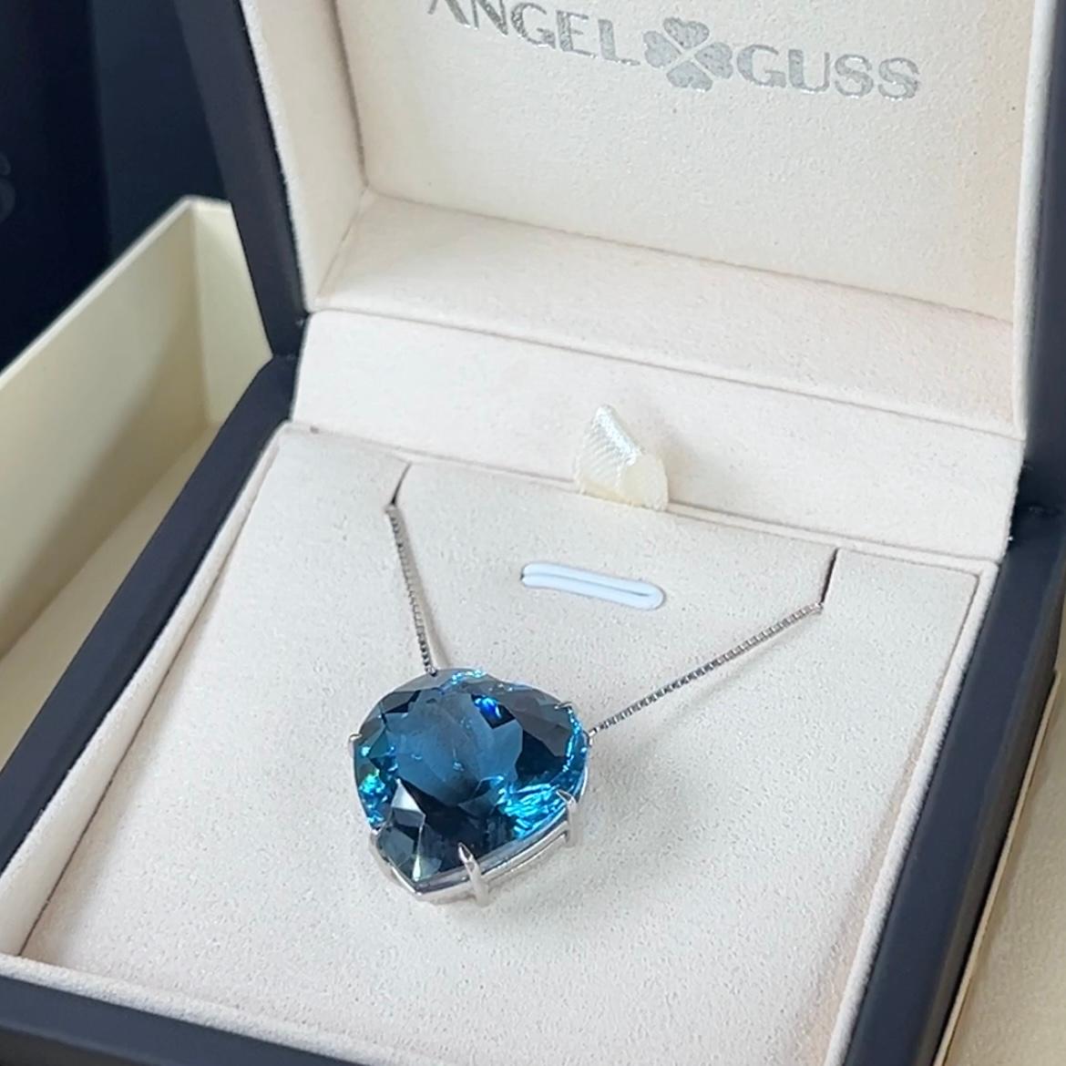 
18K Solid White Gold
Genuine London Topaz, Heart Shape, 20x20mm, Cut: Excellent 
Necklace Gross Weigth: 11.7g

A statement of refined elegance, this necklace showcases a genuine London Blue Topaz in a romantic heart shape, measuring an impressive