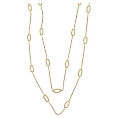 18K Gold Long Chain of Diamond Lozenges, with Diamonds Set on both sides.