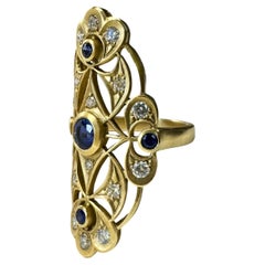 Anillo Largo Oro 18k c/ 1,02cts. Zafiros azules y 0,90cts. Diamantes